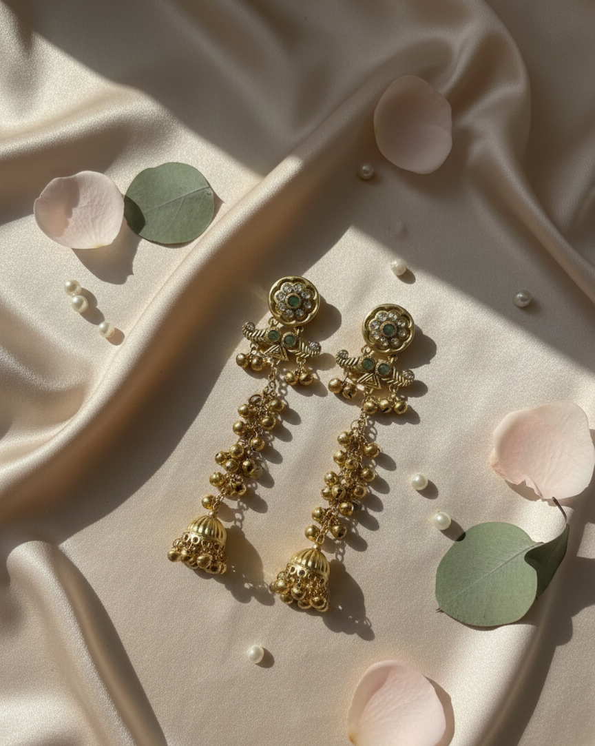 Gold-Plated Long Jhumka Earrings with Green Stone Detailing